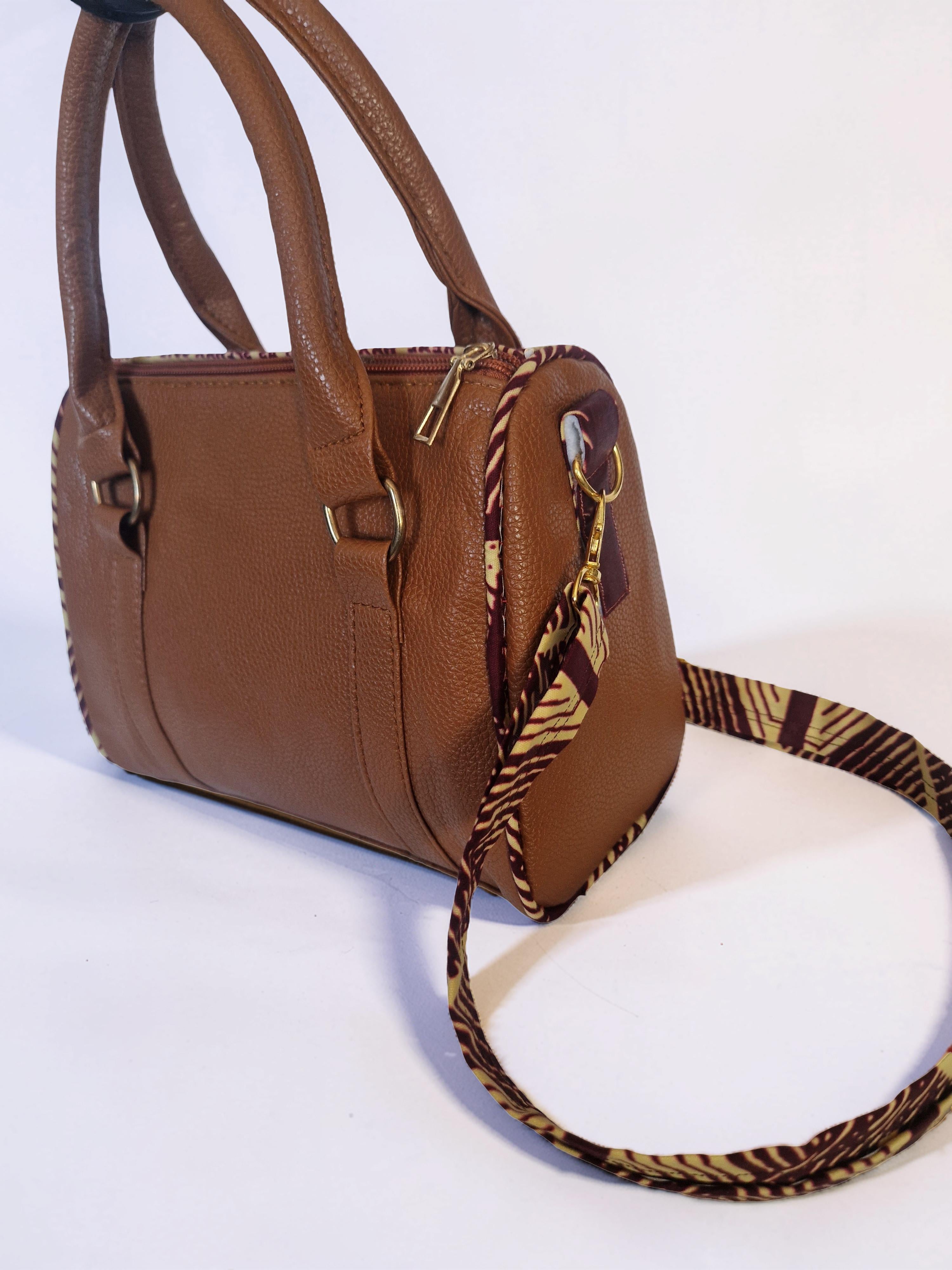 African waxprint/Vegan lether barrel bag(1295 kr)